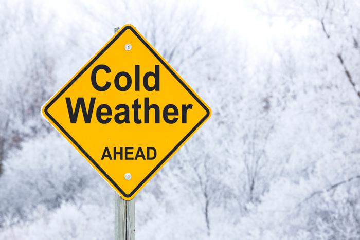 sign that says Cold Weather Ahead, which can lead to vitamin d deficiencies and depression