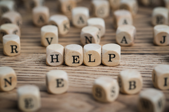 Block letters spelling out help by someone seeking help for their depression