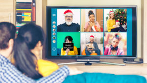 Loved ones having a virtual holiday celebration in a new tradition to minimize stress and avoid holiday depression.