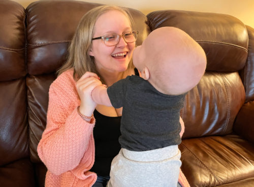 Playing with her infant son, Amanda’s depression had kept her from enjoying her life, but with support from her family, she sought treatment.