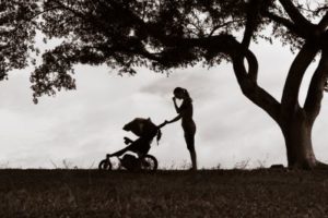 silhouette of woman who has postpartum depression