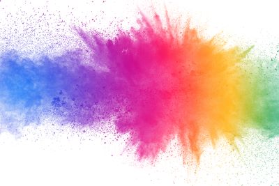 Colorful powder explosion on white background, showing how Jim Carrey used art to help manage depression symptoms.