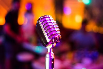 Close up of a microphone at karaoke bar, showing how panic attacks may come without warning and in the absence of stressful situations.