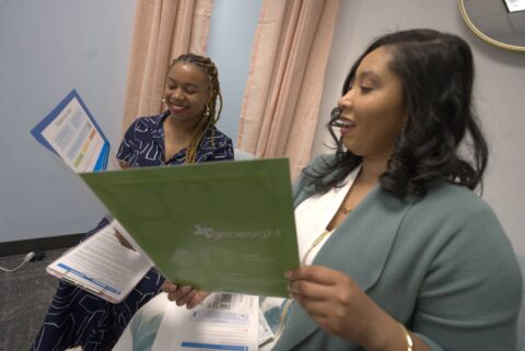 Dr. Whitnee Brown, DNP, CRNP, PMHNP, FNP, reviewing the GeneSight test results with her patient.